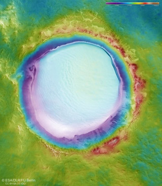 Illustration for article titled Las últimas imágenes de Marte nos muestran a Korolev, el impresionante cráter repleto de hielo
